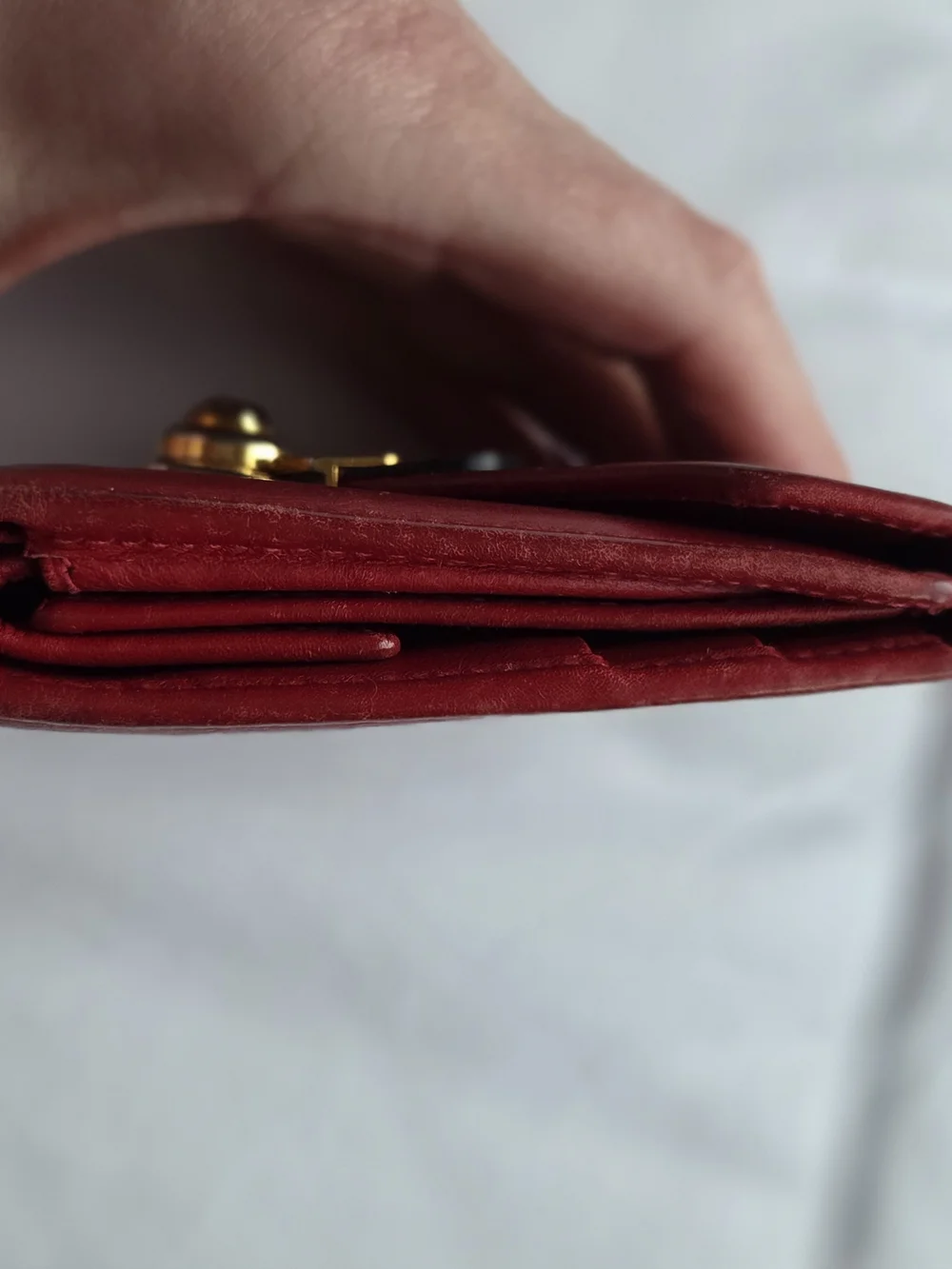 Red Leather Salvatore Ferragamo Wallet Featuring a Gold Gancini Clasp